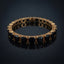 Gold-Tone Black Princess-Cut CZ Tennis Bracelet product shot on dark surface