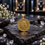 Gold-tone round coin-style pendant with a crowned portrait, decorative lettering, dotted border and bail displayed on dark stone.