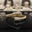 Silver-tone CZ pavé double teardrop bypass bangle with full micro-pavé CZ coverage