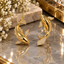 Gold-Tone Fish Earrings with Clear Accent Fins