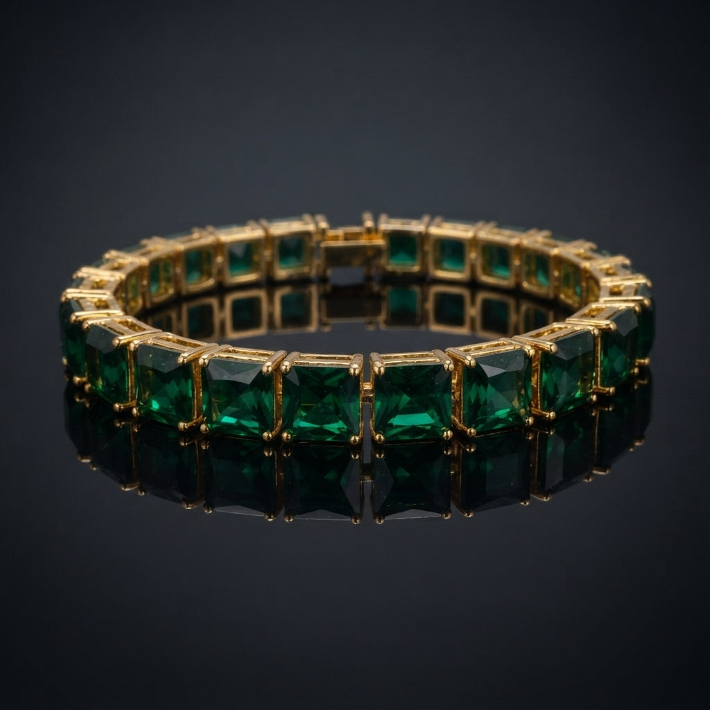 Gold-Tone Emerald Green Princess-Cut CZ Tennis Bracelet product shot on dark surface