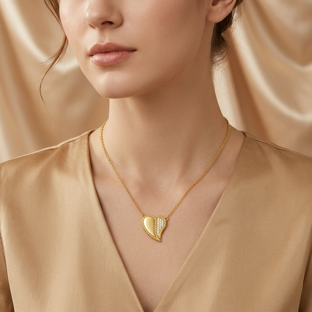 Gold-Tone Half CZ Pavé Rope Twist Heart Pendant Necklace worn by model on beige background