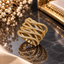 Gold-Tone Interwoven Wave Ring with Clear Accents