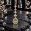 Gold-tone ornament with a mint green teardrop centre, double clear-accent teardrop frames, a clear round cluster and three pale blush fan-shaped links.