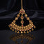 Gold-tone Rajwari jhummar with ruby red and white stone floral accents, coin medallions, and gold bead tassels