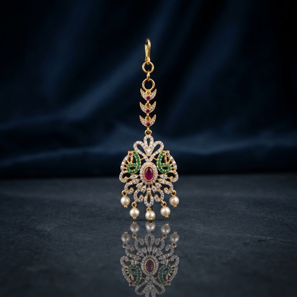 Gold-tone Rajwari ruby and emerald CZ floral peacock maang tikka with pearl drops