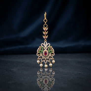 Gold-tone Rajwari ruby and emerald CZ floral peacock maang tikka with pearl drops