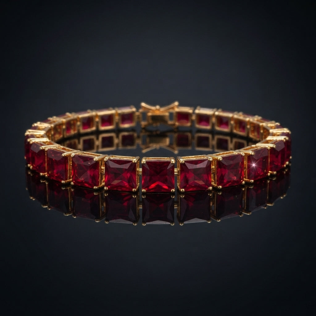 Gold-Tone Ruby Red Princess-Cut CZ Tennis Bracelet product shot on dark surface