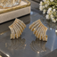 Gold-Tone Wing-Style Earrings with Clear Accents