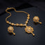 Gold Two-Tone Filigree Rose Pendant Necklace and Berry Drop Earrings Set — 22K antique gold-tone 2-piece set with diamond rhombus station chain with rhodium marquise leaf accents large 8-petal open filigree rose pendant with rhodium marquise star center and triple gold berry drop and matching round dome filigree rose berry drop earrings displayed on dark mirror black surface with mirror reflection