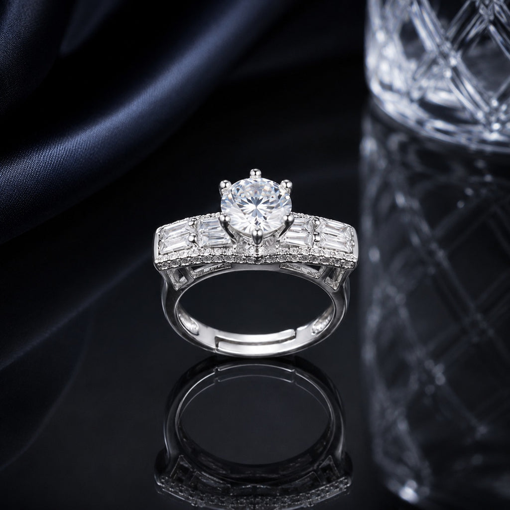 Silver CZ solitaire statement ring with round center stone and baguette side detailing