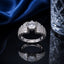 Silver CZ baguette solitaire statement ring with round center stone and layered detailing