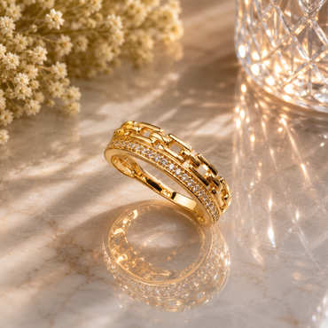 Elegant gold-tone chain link crystal ring with sparkling stone detailing