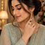 Gold-Tone White & Black Pearl CZ Lotus Crown Toi et Moi Bypass Ring worn by model in Pakistani bridal attire