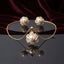 Pearl Center CZ Multi-Layer Floral Halo Pendant Necklace and Earrings Set in silver-tone flat lay on grey mirror surface with navy blue velvet backdrop showing 2-piece set with large cream pearl center in dense multi-layer white CZ floral sunburst halo pendant necklace and matching stud earrings with mirror reflection