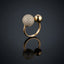 Rose Gold CZ Pavé Ball Open Bypass Adjustable Ring — rose gold-tone open adjustable bypass ring with large fully iced round white CZ micro-pavé sphere and smaller plain polished rose gold ball on slim wire shank, on dark grey mirror surface with luxury editorial backdrop