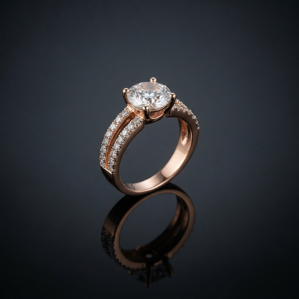 Rose Gold Round Solitaire CZ Split Double Pavé Shank Engagement Ring — rose gold-tone classic bridal engagement ring with large round brilliant white CZ solitaire in 4-prong cathedral claw setting and split double round CZ micro-pavé shank, on dark grey mirror surface with luxury editorial backdrop