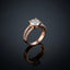 Rose Gold Round Solitaire CZ Split Double Pavé Shank Engagement Ring — rose gold-tone classic bridal engagement ring with large round brilliant white CZ solitaire in 4-prong cathedral claw setting and split double round CZ micro-pavé shank, on dark grey mirror surface with luxury editorial backdrop