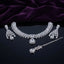 Silver CZ Cluster Choker Earrings and Maang Tikka Bridal Set in Diamond White on dark mirror surface with purple velvet backdrop showing rhodium silver wide mixed-cut white CZ cluster choker with white CZ square and pear pendant halo fan-drop earrings and maang tikka