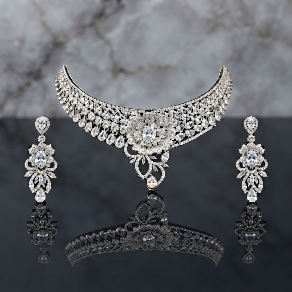 Silver CZ Grand Collar Bridal Necklace and Earrings Set in Blush Pink worn by South Asian model in mint blue embroidered kurta with marble backdrop showing wide crescent collar choker with blush pink oval CZ stones and grand floral bouquet pendant with matching drop earrings