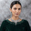 Silver CZ Grand Collar Bridal Necklace and Earrings Set editorial model shot showing South Asian model wearing the set in a luxury bridal setting