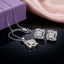 Silver-Tone CZ Square Illusion Pendant Necklace and Earrings Set on dark surface with gift box