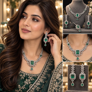 Silver Emerald Green CZ Marquise Leaf and Square Halo Necklace and Earrings Bridal Set collage showing lifestyle model wearing full set with deep forest green embroidered formal outfit plus product display on grey velvet stands and close-up detail shots of necklace centre focal and earrings