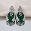 Silver Emerald Green CZ Oval Cluster and Pearl Vine Twisted Leaf Grand Drop Earrings worn by model in emerald green velvet top on grey backdrop showing grand statement drop earrings with lotus stud and twisted leaf emerald CZ cluster drop with pearl vine