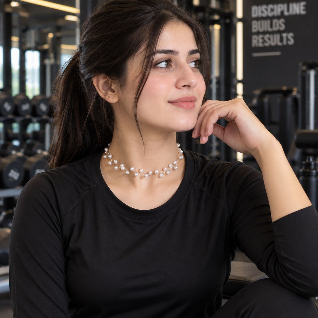 Silver Floating Pearl Vine Branch Choker Necklace worn by model in black outfit at gym setting