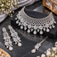 Clear-accent floral bridal necklace set with matching earrings and maang tikka.