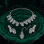 Silver-Tone Mint Jade Green Oval Cabochon & White CZ Pavé Arabesque Vine Leaf Choker Necklace Drop Earrings & Maang Tikka 3-Piece Bridal Set on malachite green stone tray with dark green velvet backdrop