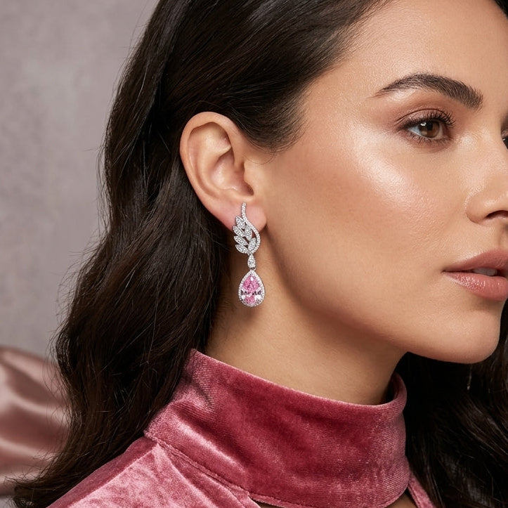 Silver-Tone Pink CZ Teardrop Halo Wheat Leaf Long Drop Earrings worn by model in pink velvet top