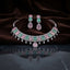 Silver Pink & Mint Green Cabochon CZ Torque Necklace & Drop Earrings Bridal Set on dark grey marble surface with dark brown velvet drape backdrop