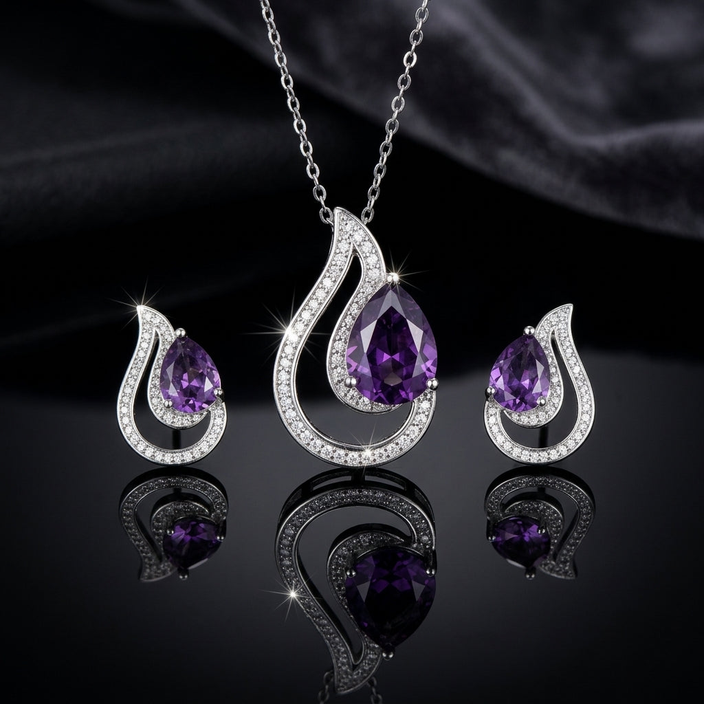 Silver-Tone Purple CZ Teardrop Swirl Pendant Necklace and Earrings Set on dark background