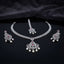 Silver Ruby CZ and Pearl Crown Pendant Necklace Maang Tikka and Drop Earrings Bridal Set — rhodium silver-tone 3-piece bridal set with white CZ micro-pavé wheat chain necklace and large Gothic crown filigree pendant with ruby CZ apex and 5 pearl fringe drops matching maang tikka with crown motif and 2 pearl drops and matching crown shield drop earrings with ruby CZ and 2 pearl drops displayed on dark mirror surface with black satin backdrop