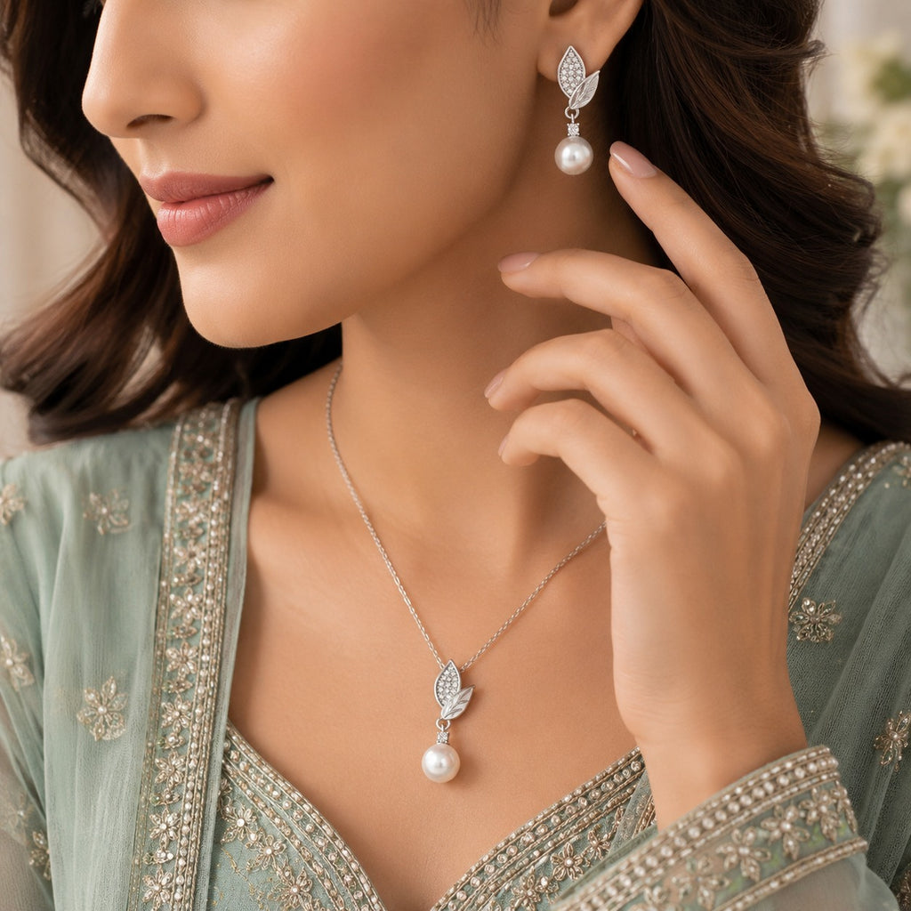 Silver-Tone CZ Pavé Leaf & Pearl Drop Pendant Necklace & Earrings Jewelry Set worn by model in Pakistani sage green formal attire