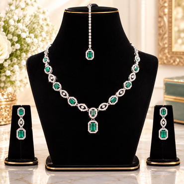 Silver-tone emerald green emerald-cut CZ halo rectangle link necklace earrings and maang tikka bridal set