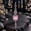 Silver-tone AD bindia with a pink rectangular centre, clear-accent angular frame, marquise floral cluster, two open oval links and a pink teardrop drop.