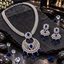 Silver-tone royal-blue AD mala set with a clear leaf-pattern neckline, open crescent pendant, rectangular blue centres, teardrop drops and matching earrings.
