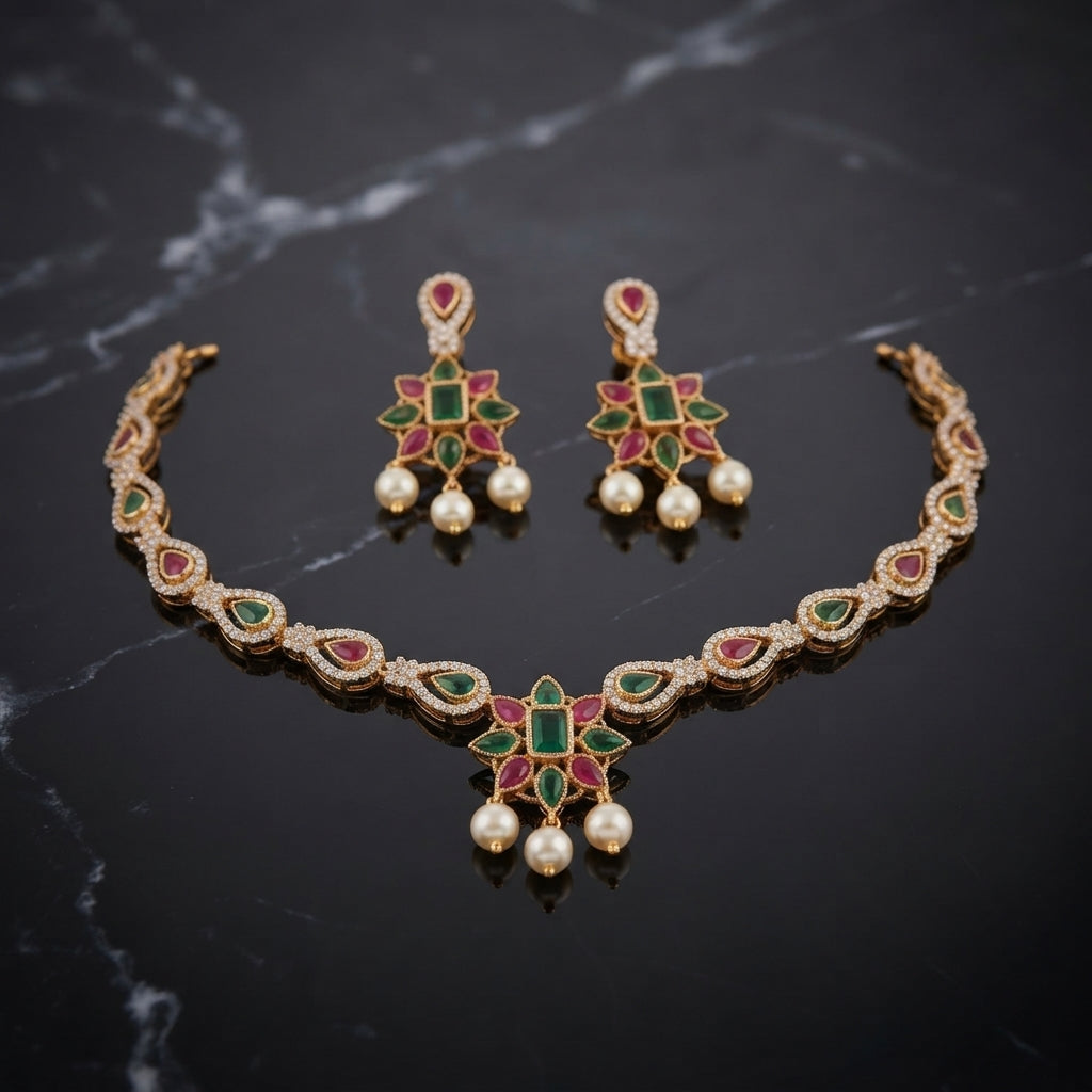 South Indian-style red floral pendant necklace with white pearl-look beads and matching drop earrings.