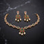 South Indian-style red floral pendant necklace with white pearl-look beads and matching drop earrings.