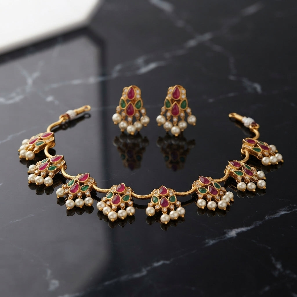 South Indian style ruby and emerald necklace set with pearl drops and matching earrings